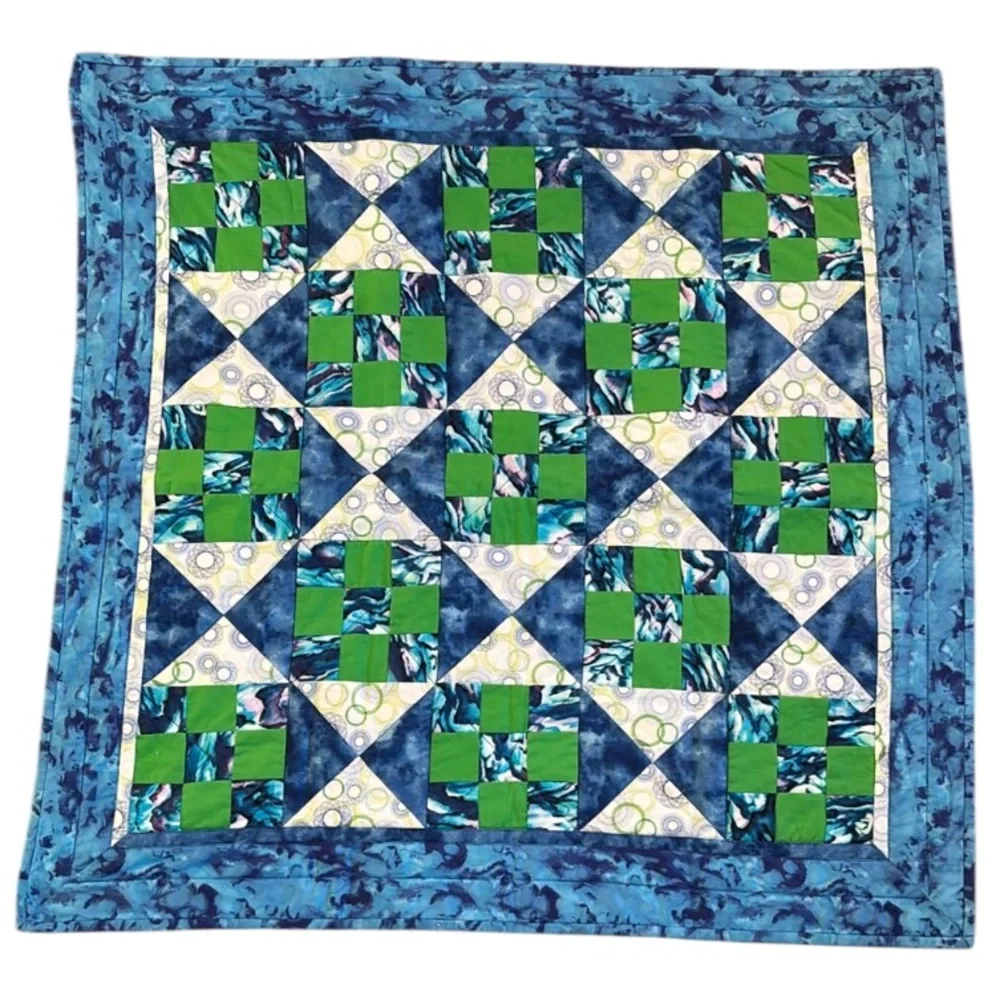 Blue and Green Patchwork Quilt